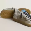 Ball Star LTD med folieret crackle læderstjerne og brun læderhælkappe