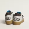 Ball Star LTD med folieret crackle læderstjerne og brun læderhælkappe