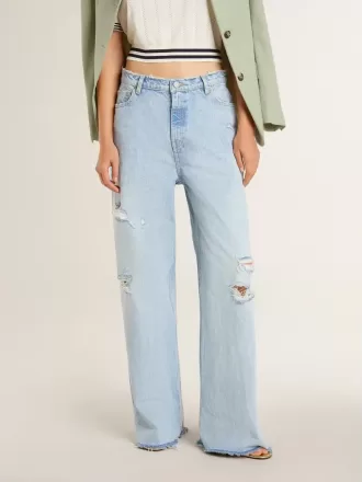 Dame bukser i denim med slidt look