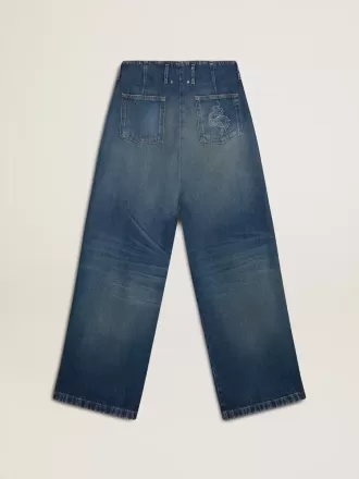 Dameskinner med vid benvidde og medium vask CNY jeans