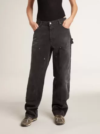 Distressed sorte bomuldsjeans til kvinder med patches foran