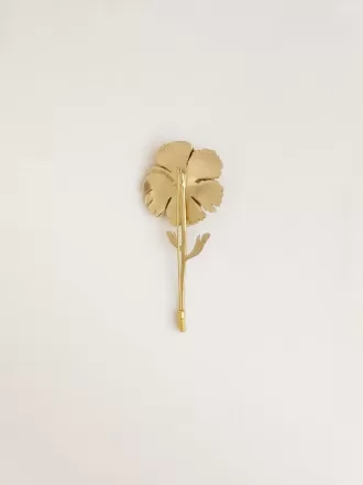 Guldnål med blomsterdesign