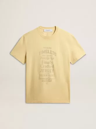 Herre-T-shirt i bomuld i lysegul med falmede bogstaver
