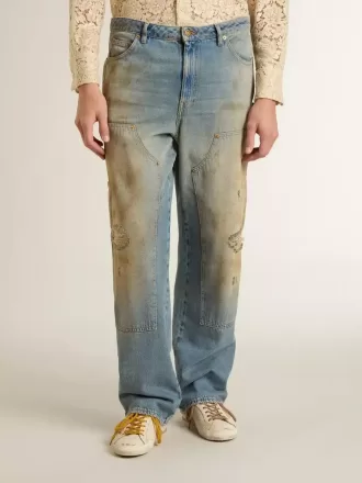 Herrejeans i distressed sandvasket look