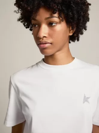 Hvid T-shirt til kvinder med sølvglitterstjerne på fronten