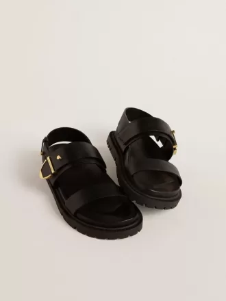 Lucy-sandaler til kvinder i blankt sort læder med guldfarvet metalspænde