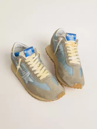 Marathon til mænd med lyseblå nylonoverdel og pastellblå stjerne