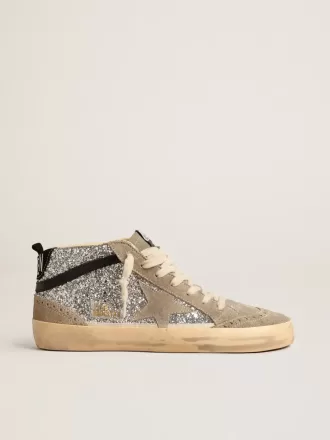 Mid Star i sølvglitter med ruskindstjerne og sort flash