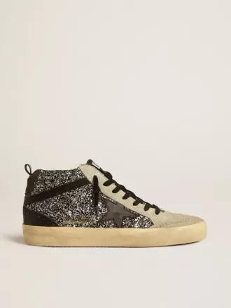 Mid Star LTD i sort glitter med sort læderstjerne og flash