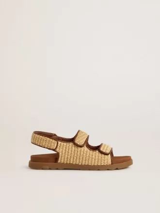 Noa-sandaler til børn i beige raffia og brunt læder Noa-sandaler til børn i beige raffia og brunt læder