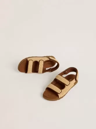 Noa-sandaler til børn i beige raffia og brunt læder Noa-sandaler til børn i beige raffia og brunt læder