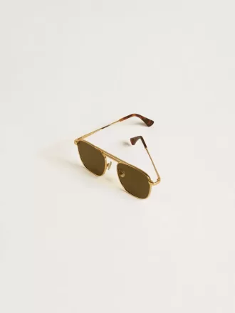 Solbriller i aviator-stil med guldstel og grønne glas
