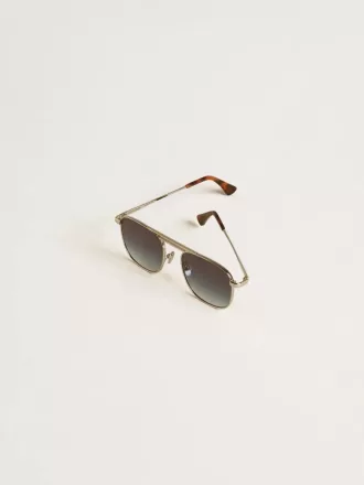 Solbriller i aviator-stil med sølvfarvet stel og blå glas
