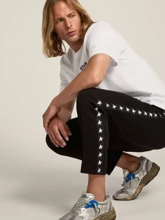 Sorte joggingbukser til mænd med hvide stjerner på siderne