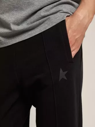 Sorte joggingbukser til mænd med stjerne på fronten
