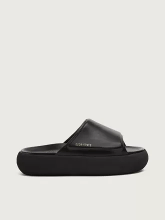 Space-Star Slide slip-ons til kvinder i sort læder
