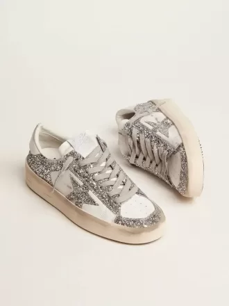 Stardan til kvinder i hvidt læder og glitter