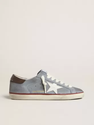 Super-Star LTD i lyseblåt nubucklæder med hvid læderstjerne og brun læderhælkappe Super-Star LTD i lyseblåt nubucklæder med hvid læderstjerne og brun læderhælkappe