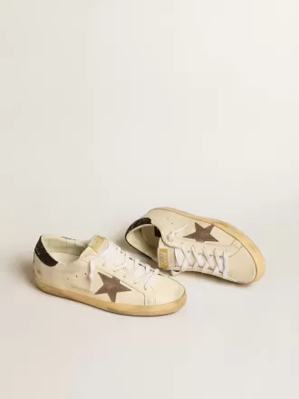 Super-Star LTD med lamineret læderstjerne og sort glitterhælkappe