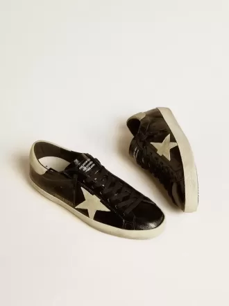 Super-Star LTD til mænd i sort laklæder med ruskindsstjerne og hælkappe