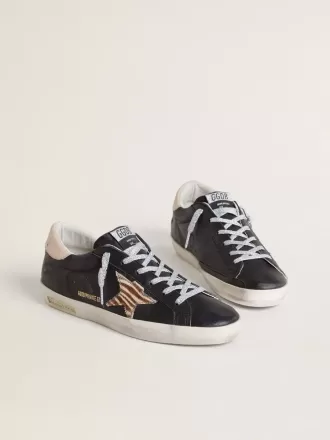 Super-Star til kvinder i sort nappalæder med zebraprintet ponyhudstjerne og beige læderhælkappe